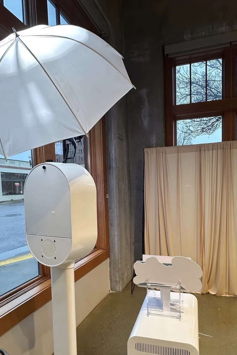 The photo booth set up with lighting at a venue.